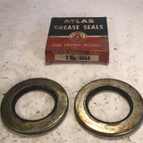 1941-1954 Chevrolet GMC Corvette front wheel grease seals pair NOS Atlas 6064