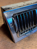 1958-1960 Ford Thunderbird center dash AC vent assembly including bezel
