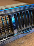 1958-1960 Ford Thunderbird center dash AC vent assembly including bezel
