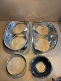 1958 Ford Fairlane 500 Custom Skyliner headlight bezels eyebrow moulding