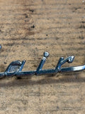 1956 Ford Fairlane hood script emblem OEM