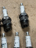Trojan 4T spark plugs x8 NORS no boxes