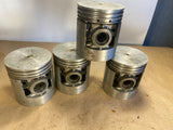 Wisconsin 4-cylinder replacement pistons #566 .003 O/S NOS