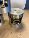 Wisconsin 4-cylinder replacement pistons #566 .003 O/S NOS