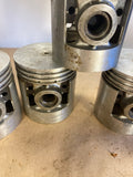 Wisconsin 4-cylinder replacement pistons #566 .003 O/S NOS