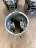 Wisconsin 4-cylinder replacement pistons #566 .003 O/S NOS