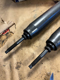 1968-1974 Chevy II Nova Apollo Skylark El Camino front shock absorber pair NORS Atlas brand