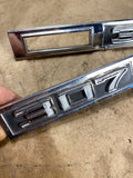 1969 Chevelle 307 front fender badge and light bezel Pair LH RH