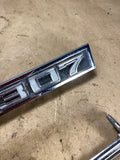 1969 Chevelle 307 front fender badge and light bezel Pair LH RH